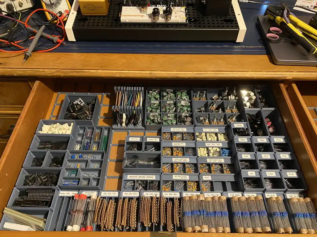 picture of drawer of electronics, neatly organised